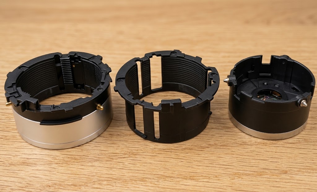 Canon IXUS 55 objektiivin kehät huoltoa varten